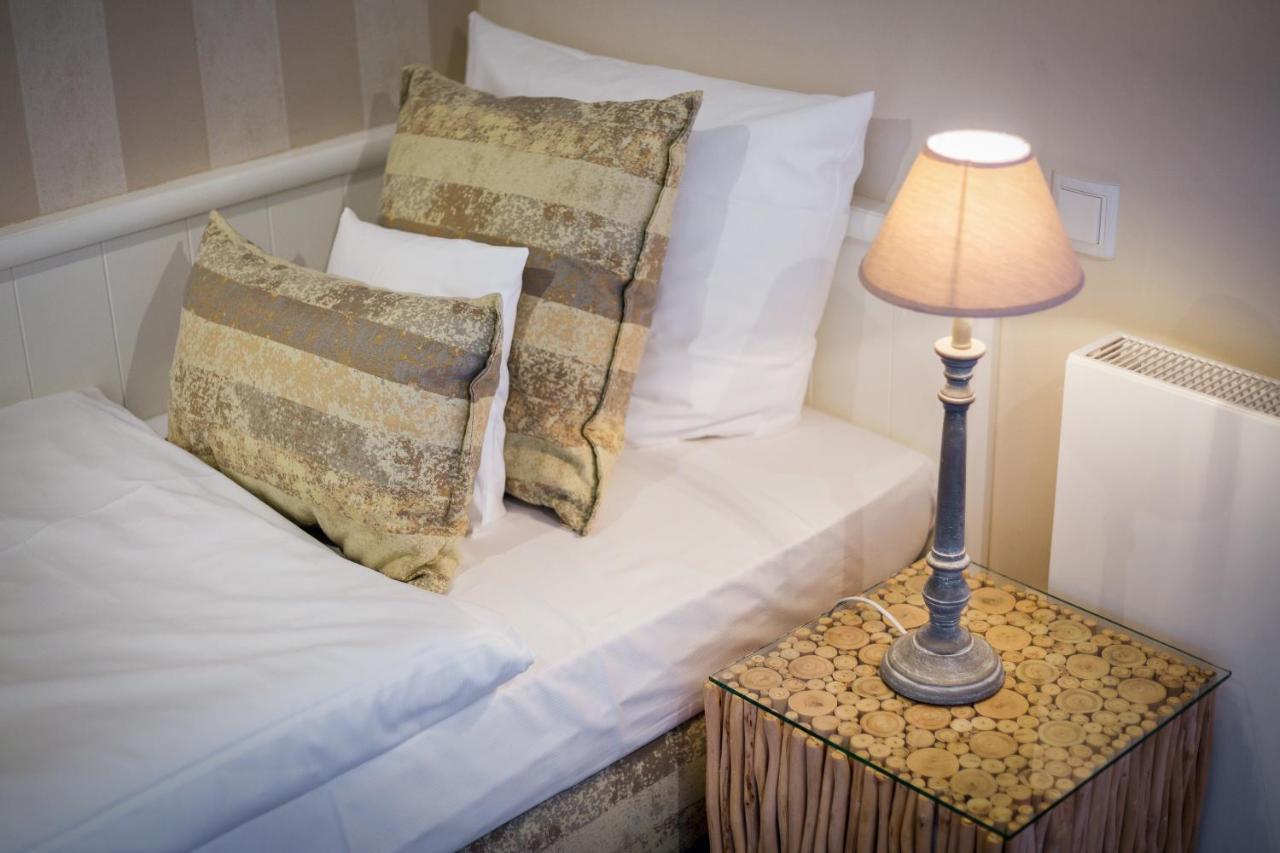 Apartmenthotel Am Leuchtturm Хёрнум Экстерьер фото