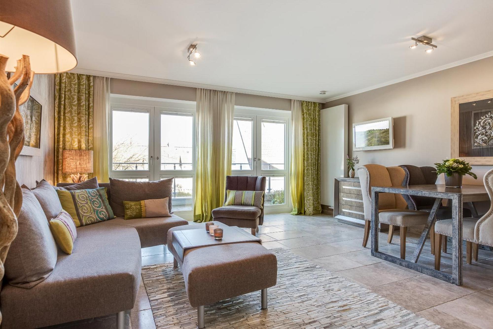 Apartmenthotel Am Leuchtturm Хёрнум Экстерьер фото