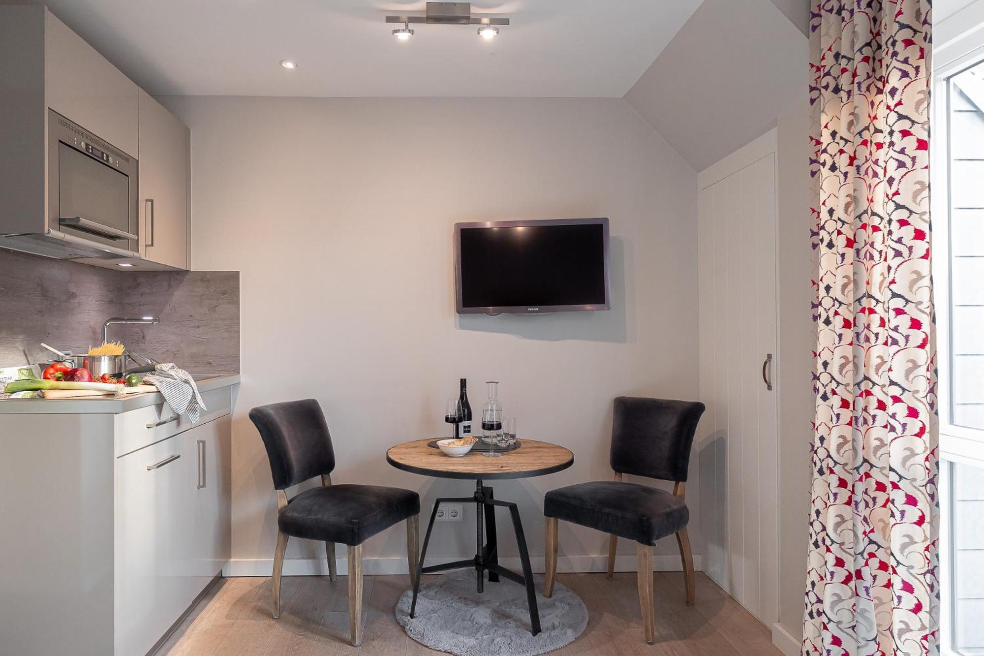 Apartmenthotel Am Leuchtturm Хёрнум Экстерьер фото