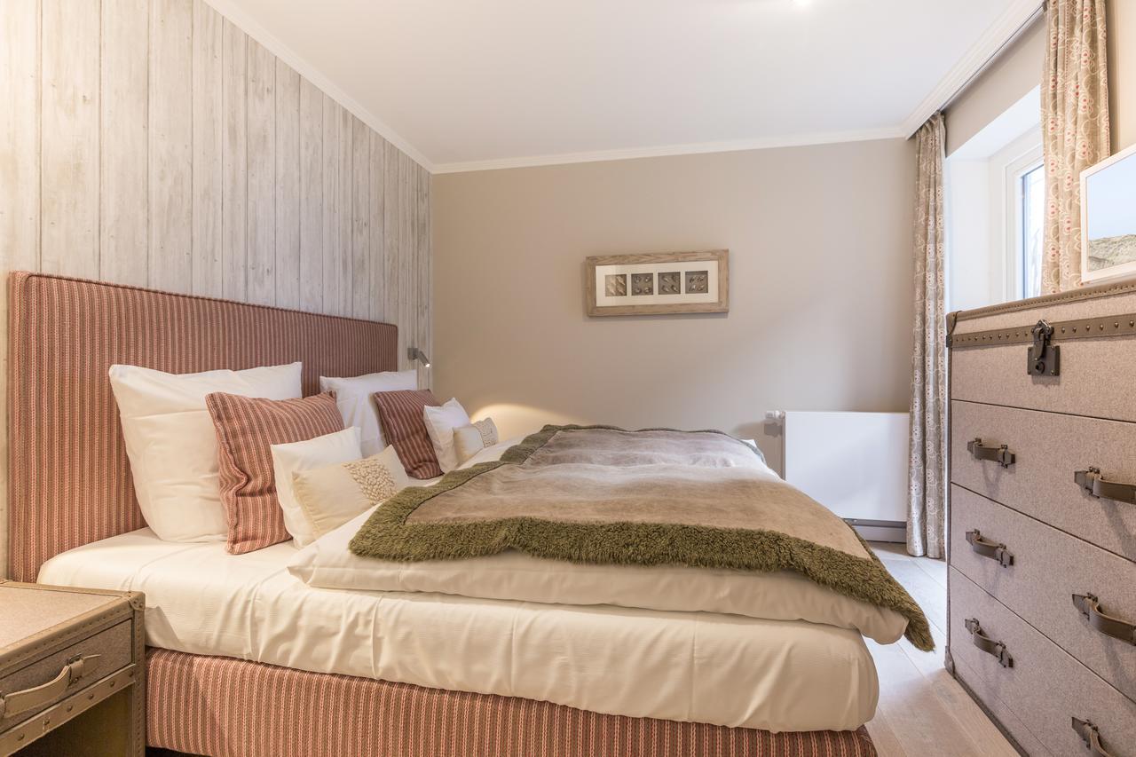 Apartmenthotel Am Leuchtturm Хёрнум Экстерьер фото