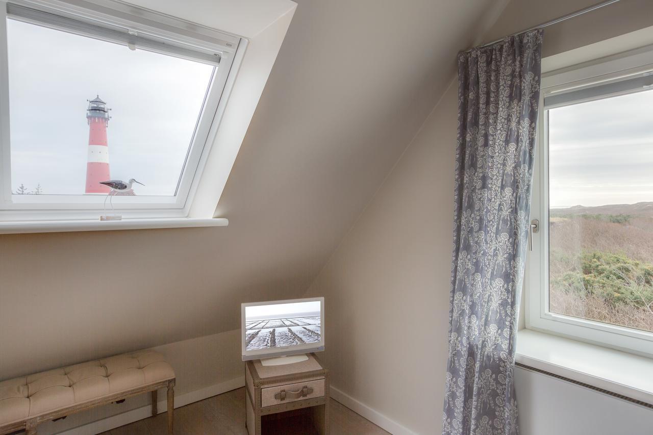 Apartmenthotel Am Leuchtturm Хёрнум Экстерьер фото