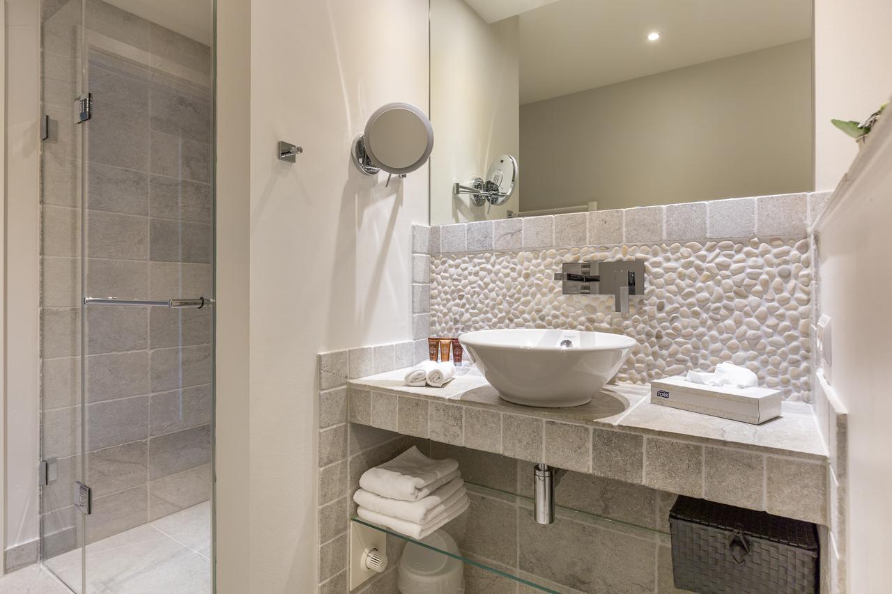 Apartmenthotel Am Leuchtturm Хёрнум Экстерьер фото