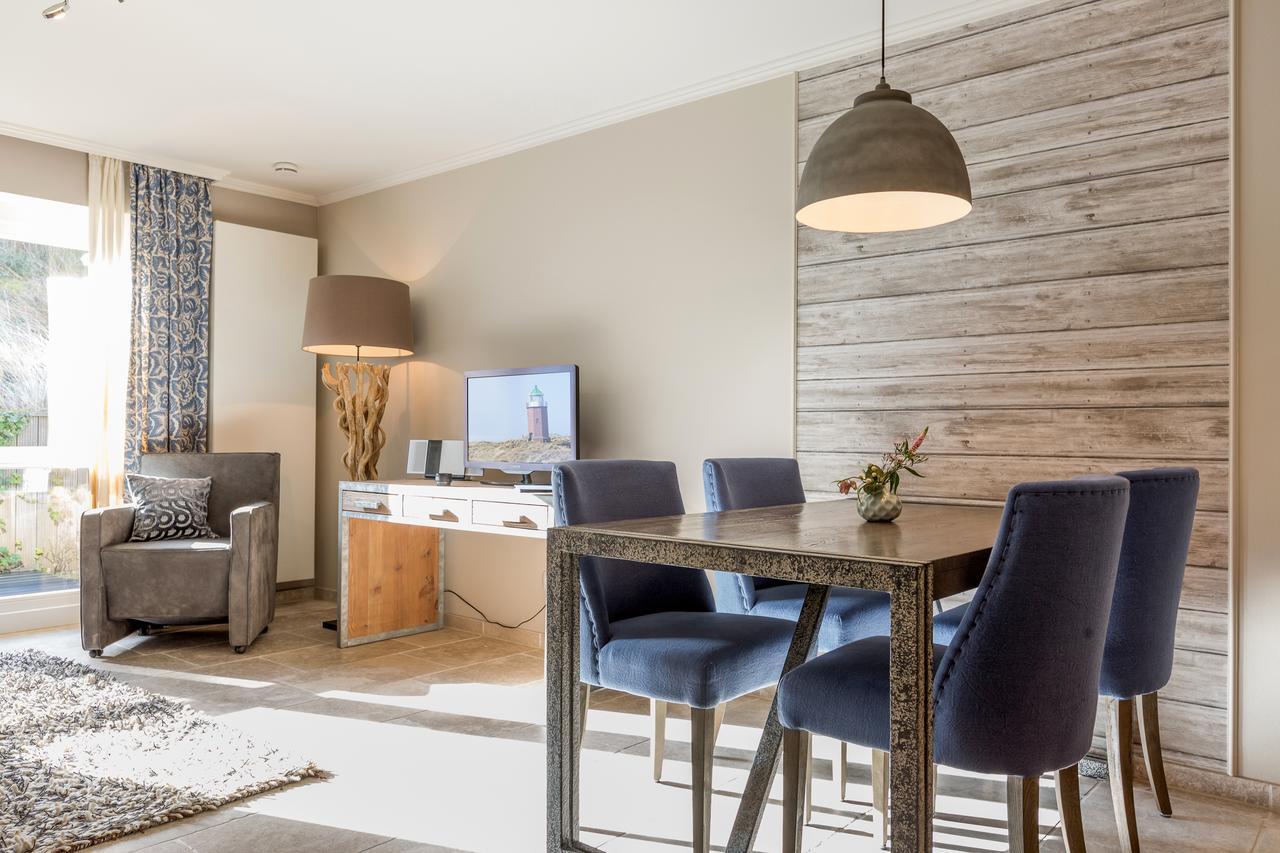 Apartmenthotel Am Leuchtturm Хёрнум Экстерьер фото
