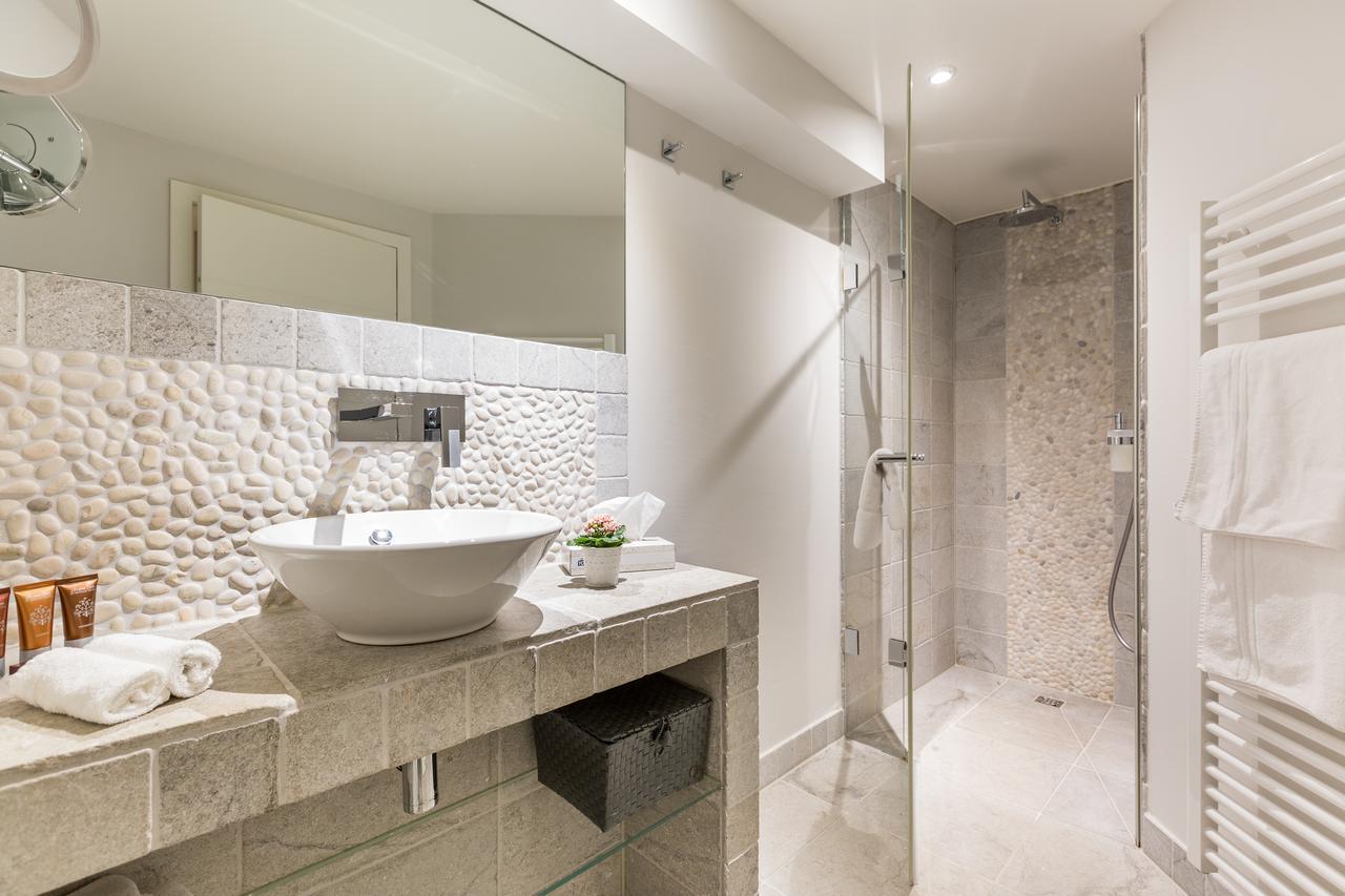 Apartmenthotel Am Leuchtturm Хёрнум Экстерьер фото