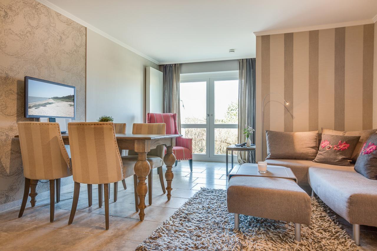Apartmenthotel Am Leuchtturm Хёрнум Экстерьер фото