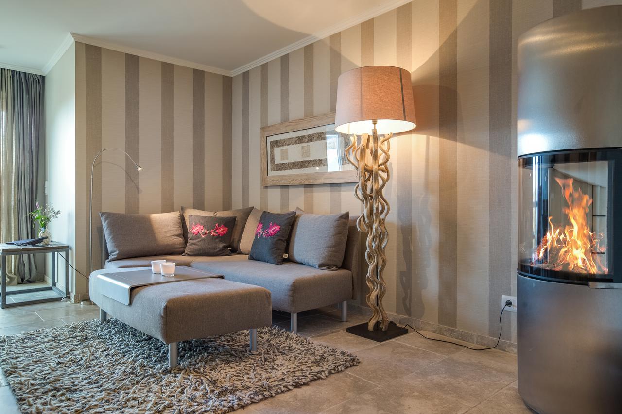 Apartmenthotel Am Leuchtturm Хёрнум Экстерьер фото