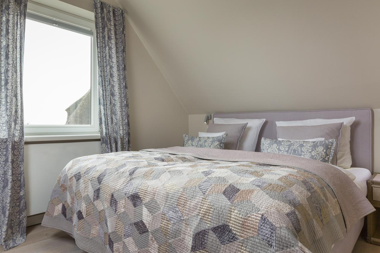 Apartmenthotel Am Leuchtturm Хёрнум Экстерьер фото
