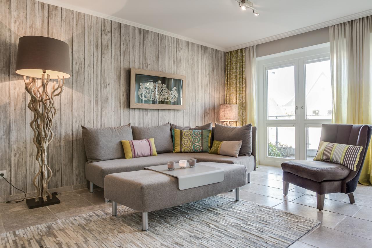 Apartmenthotel Am Leuchtturm Хёрнум Экстерьер фото